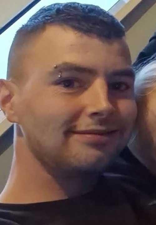 Daniel Monaghan looking towards the camera. This image is used in connection with his 2026 conviction for physically abusing his puppy.